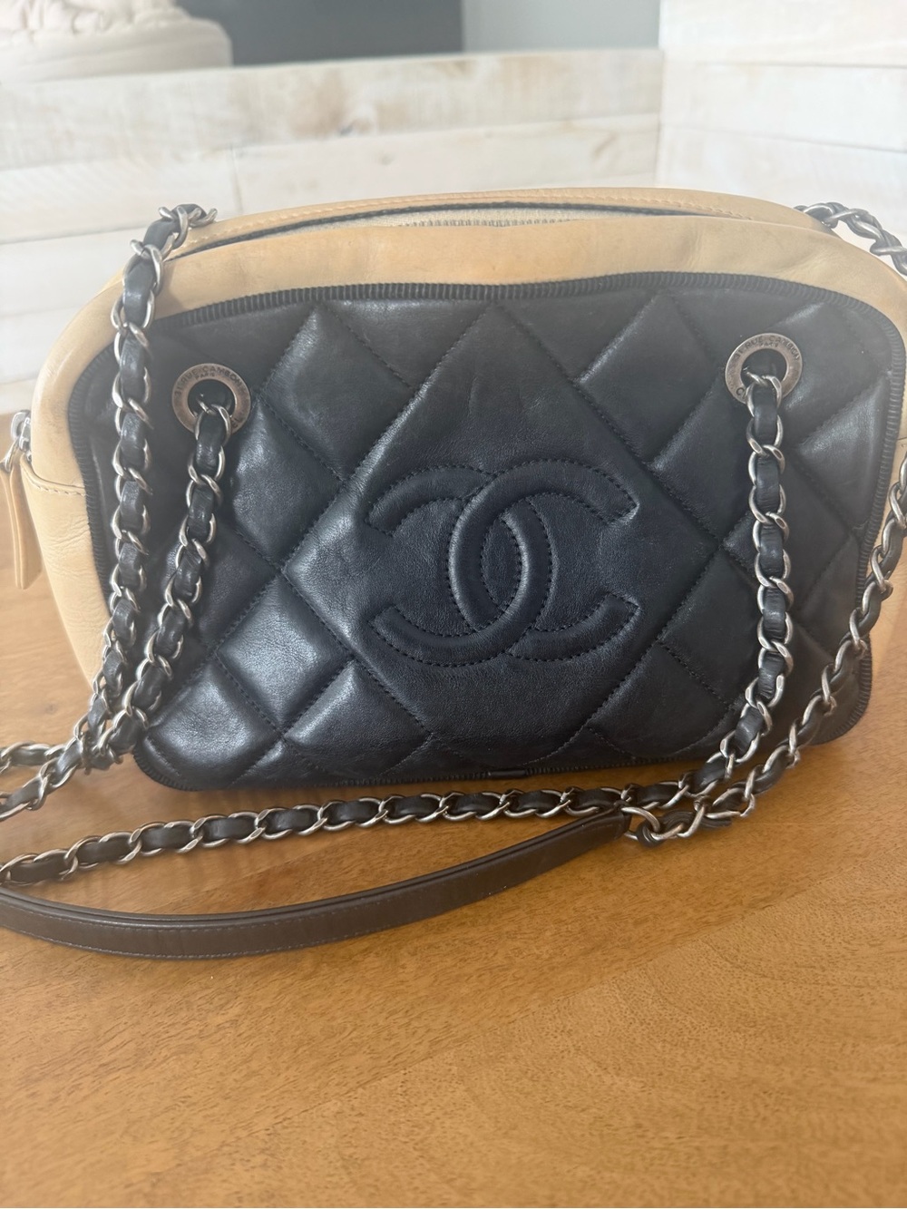 CHANEL Two-Tone Quilted Leather Shoulder Bag in Black and Tan